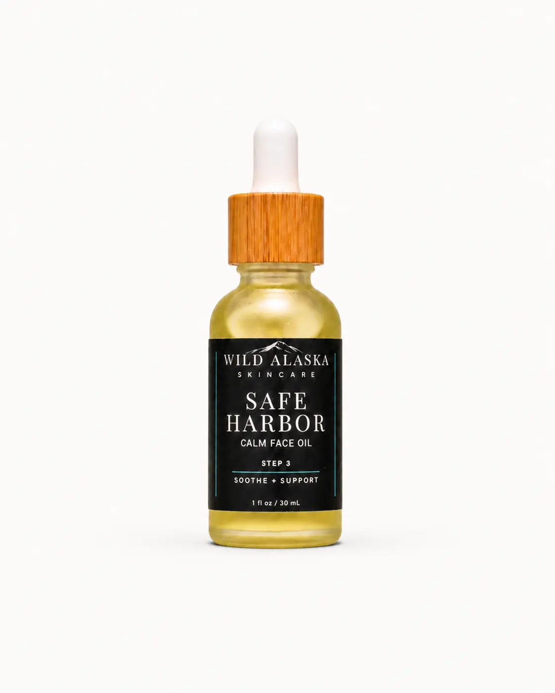 Bottle of Wild Alaska Skincare Safe Harbor Calm Face Oil on a white background