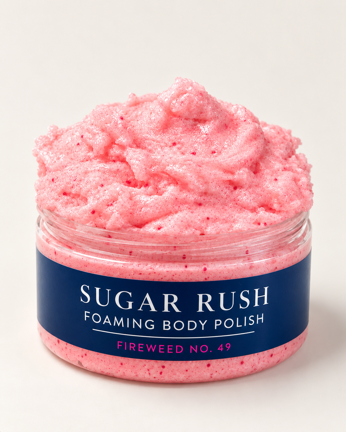 Fireweed open jar: Open jar of Sugar Rush Foaming Body Polish in Fireweed No. 49, showing its pink, whipped, speckled texture.